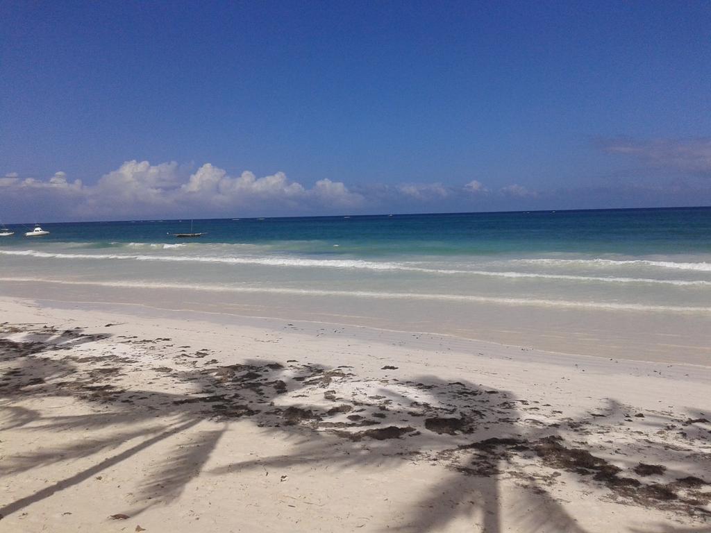 Safina Cottages Diani Beach Quarto foto