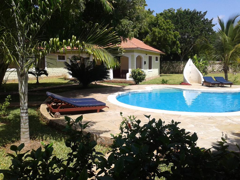 Safina Cottages Diani Beach Quarto foto